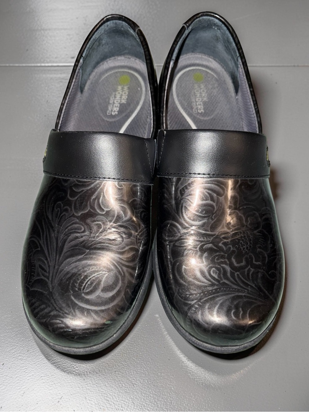 Dansko Black Floral-Embossed Leather Clogs